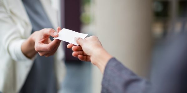 Business executives exchanging business card